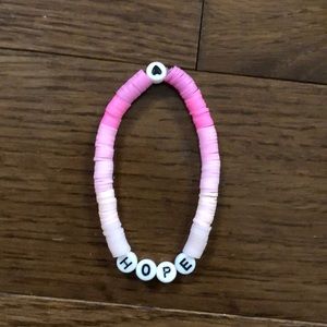 “Hope” shades of pink clay bead bracelet